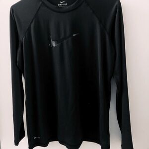 Nike swim shirt.  Gently used excellent condition.